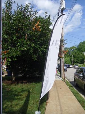 Illustrating a sail sign by church in residential neighborhood Illustrating a sail sign by church in residential neighborhood