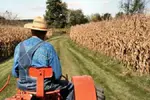 man on tractor in field