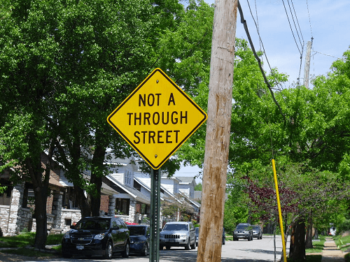 CPTED folks don't like through streets Sign saying not a through street