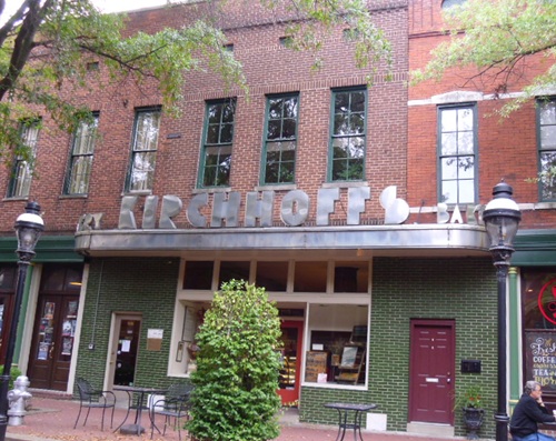 vintage looking lettering on the roof of the first story of a building vintage looking lettering on the roof of the first story of a building