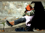 homeless person sleeping outdoors