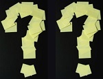 two question marks made from sticky notes