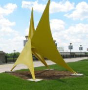 yellow abstract sculpture as example of art in public places