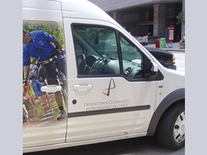 white van belonging to a business improvement district