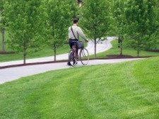 bicyclist on paved off-street trail