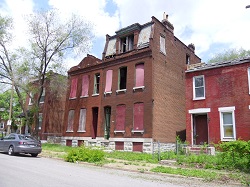 building with open and boarded-up windows, a situation that begs for solutions to concentrated poverty building with open and boarded-up windows, a situation that begs for solutions to concentrated poverty