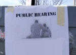 flyer for public hearing on utility pole