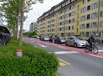 street with traffic and bicycle lanes and parking