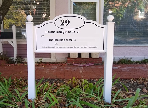 white sign for professional offices white sign for professional offices