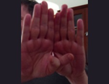 two hands up in a don't talk to me position