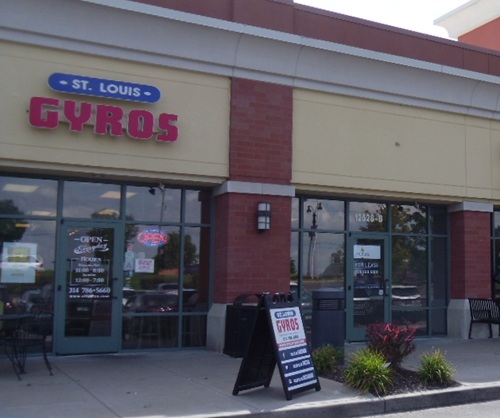 two wall mounted signs, as well as a lighted sign, window sign, and sidewalk sign two wall mounted signs, as well as a lighted sign, window sign, and sidewalk sign