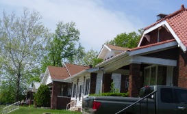 row of brick homes where materials, heights, and proportions are pleasantly similar