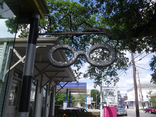 sign for eyeglass store in the shape of eyeglasses sign for eyeglass store in the shape of eyeglasses