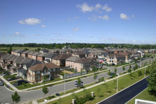 low-density subdivisions and wide roads may indicate dispersed development pattern subdivision viewed from a distance