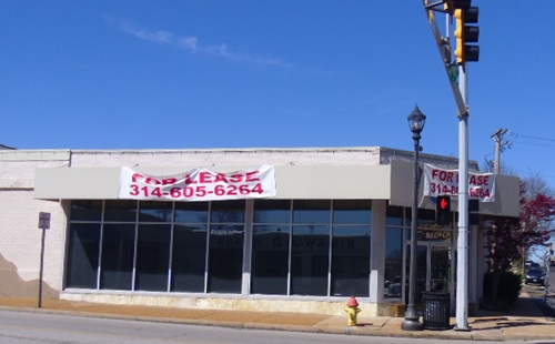 drooping large fabric banner saying for lease drooping large fabric banner saying for lease