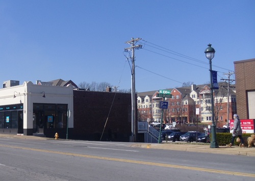overhead power lines near shops and apartments