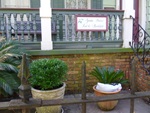 bed and breakfast sign and porch New Orleans Garden Distsrict